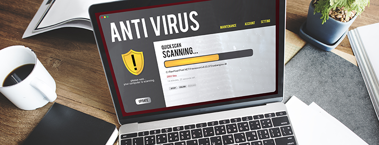 Image of laptop with an antivirus program working.