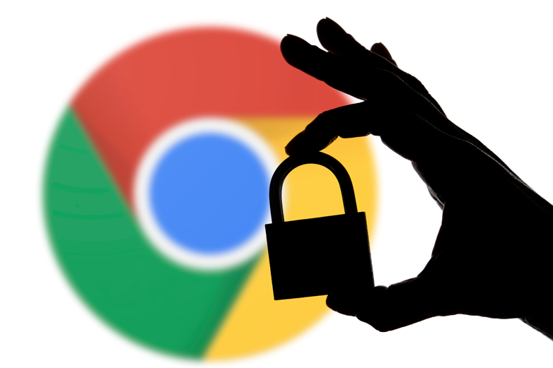 Silhouette of a hand holding padlock in front of Google Chrome logo symbolizes the importance of online security and saving, managing passwords.